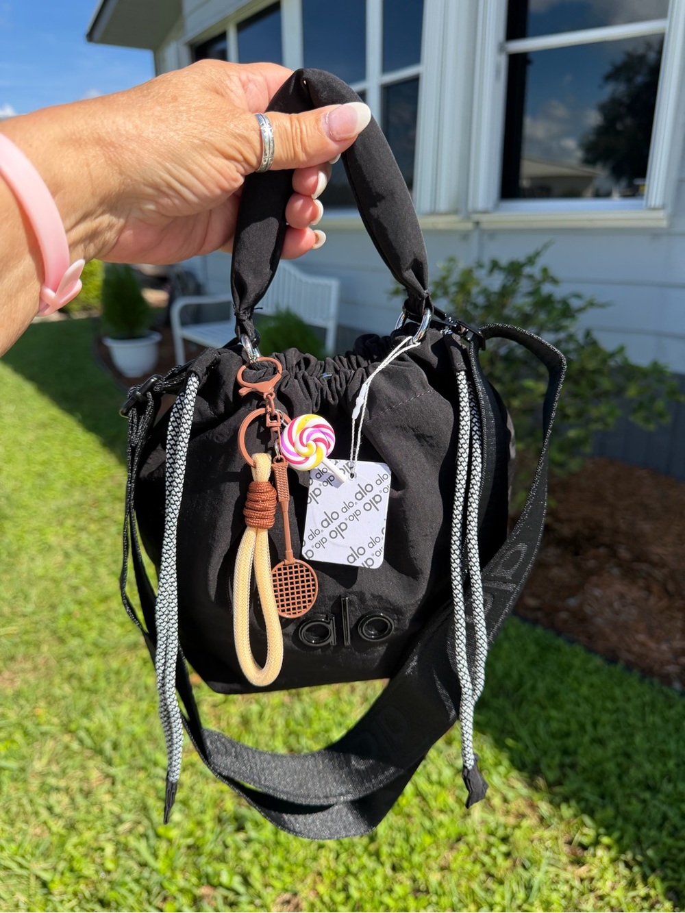 ALO Yoga Black Drawstring Mini Bucket Bag with Candy Charm - Picture 13 of 16